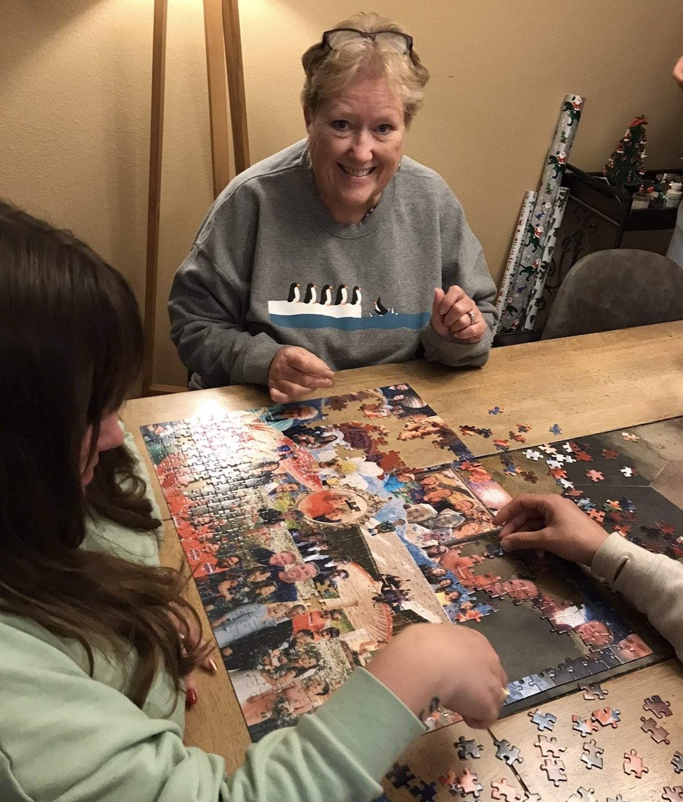 Family putting together their juxtapuzzle